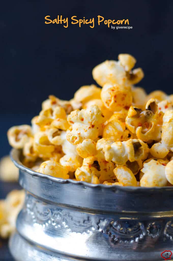 Homemade stovetop popcorn seasoned with chili powder, black pepper and cumin. #spicypopcorn #homemadepopcorn #howtomakepopcorn 铜碗里的咸辣爆米花